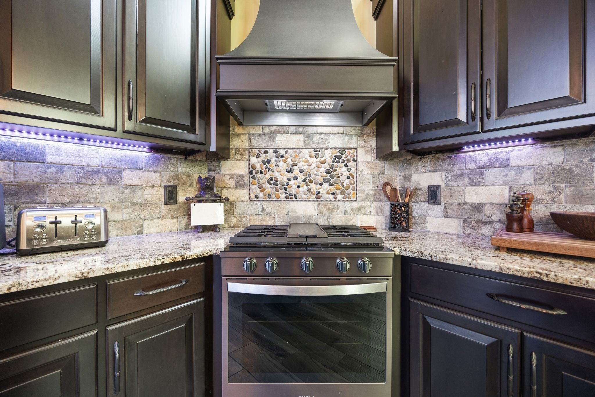 354 Mountain Farms Road Signal Mountain, TN 37377 - Photo 15 of 74 a kitchen with granite countertop stainless steel appliances a stove and a microwave