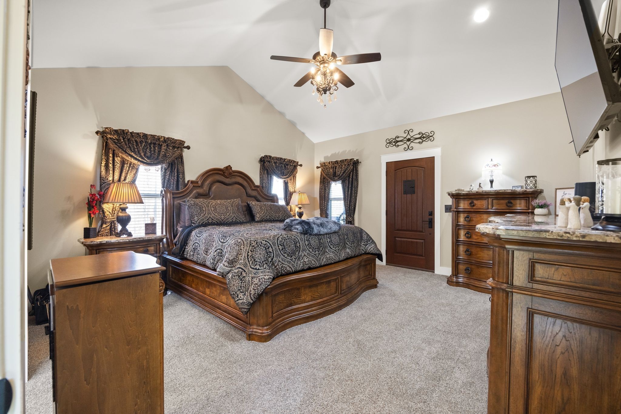 354 Mountain Farms Road Signal Mountain, TN 37377 - Photo 23 of 74 a spacious bedroom with a bed and ceiling fan