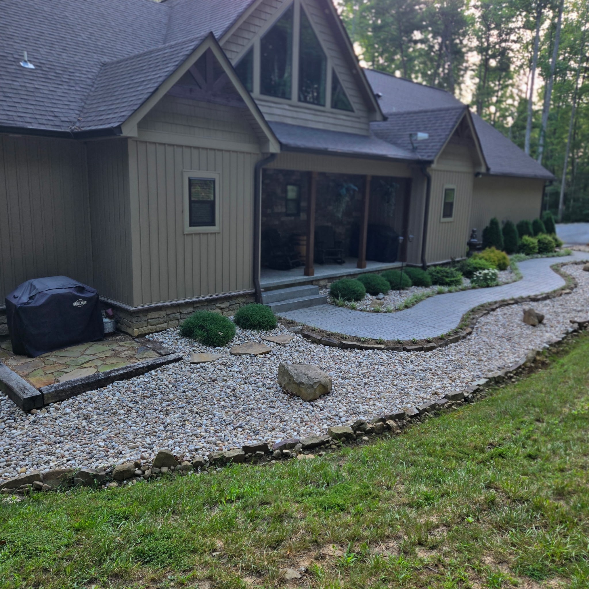 354 Mountain Farms Road Signal Mountain, TN 37377 - Photo 3 of 74 a front view of a house with garden