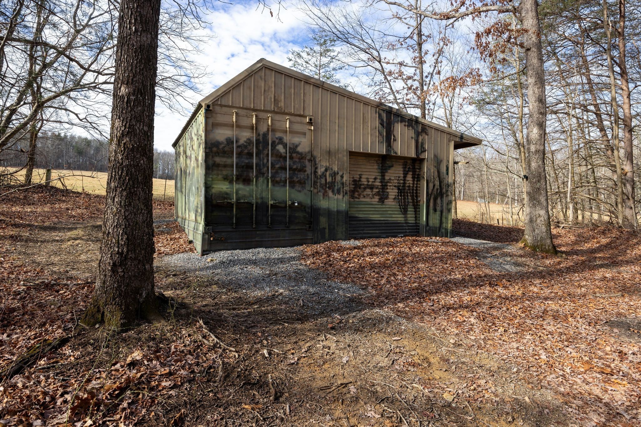 354 Mountain Farms Road Signal Mountain, TN 37377 - Photo 53 of 74 a front view of a house with a yard and garage