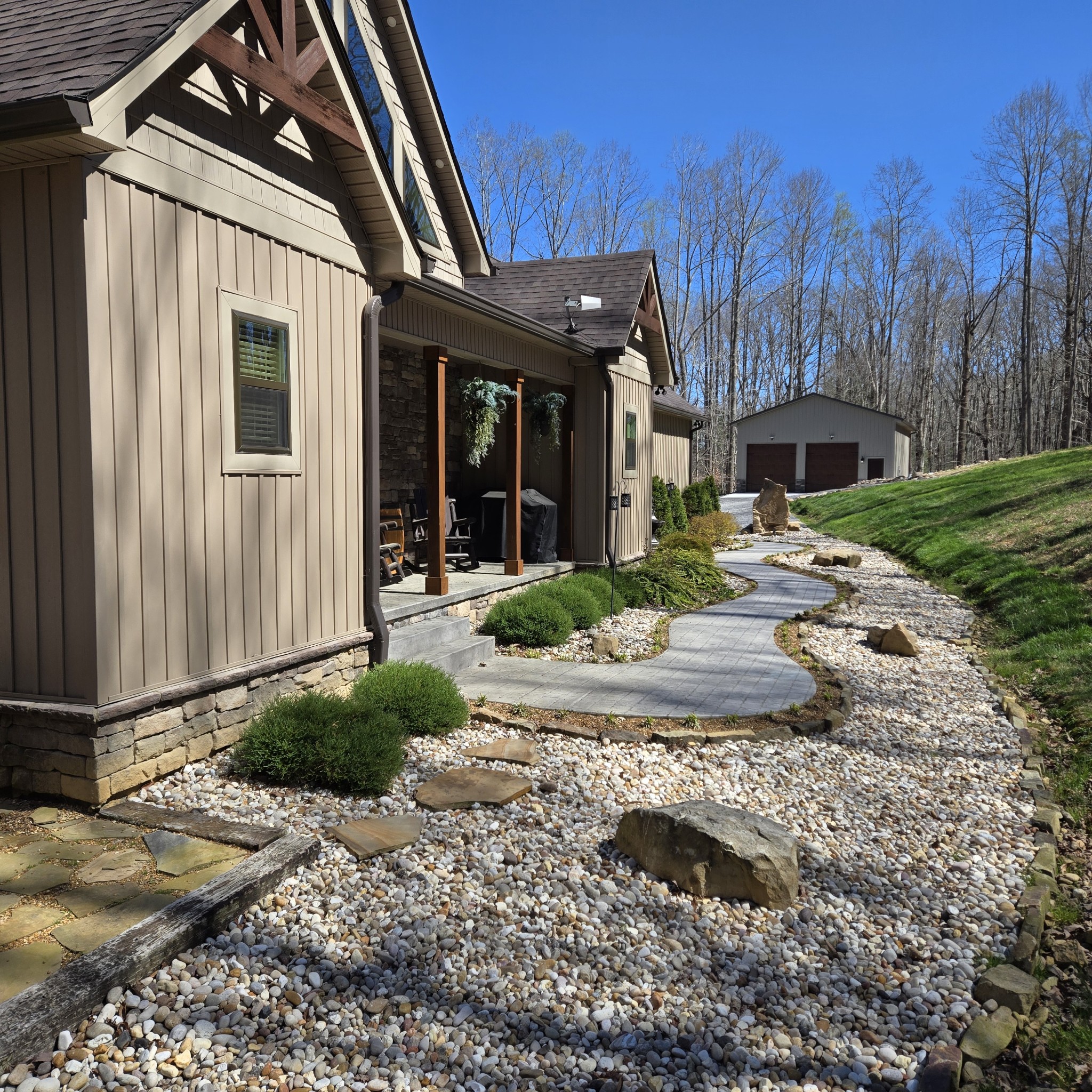 354 Mountain Farms Road Signal Mountain, TN 37377 - Photo 7 of 74 a front view of a house with garden and plants