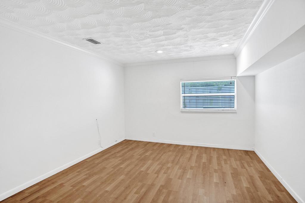2632 Southeast 10th Court Pompano Beach, FL 33062 - Photo 15 of 49 a view of empty room with wooden floor
