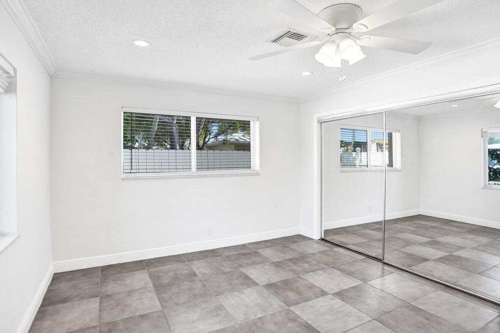2632 Southeast 10th Court Pompano Beach, FL 33062 - Photo 24 of 49 a view of an empty room with a window