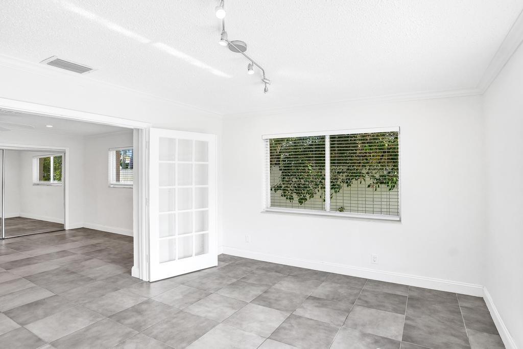 2632 Southeast 10th Court Pompano Beach, FL 33062 - Photo 34 of 49 an empty room with windows