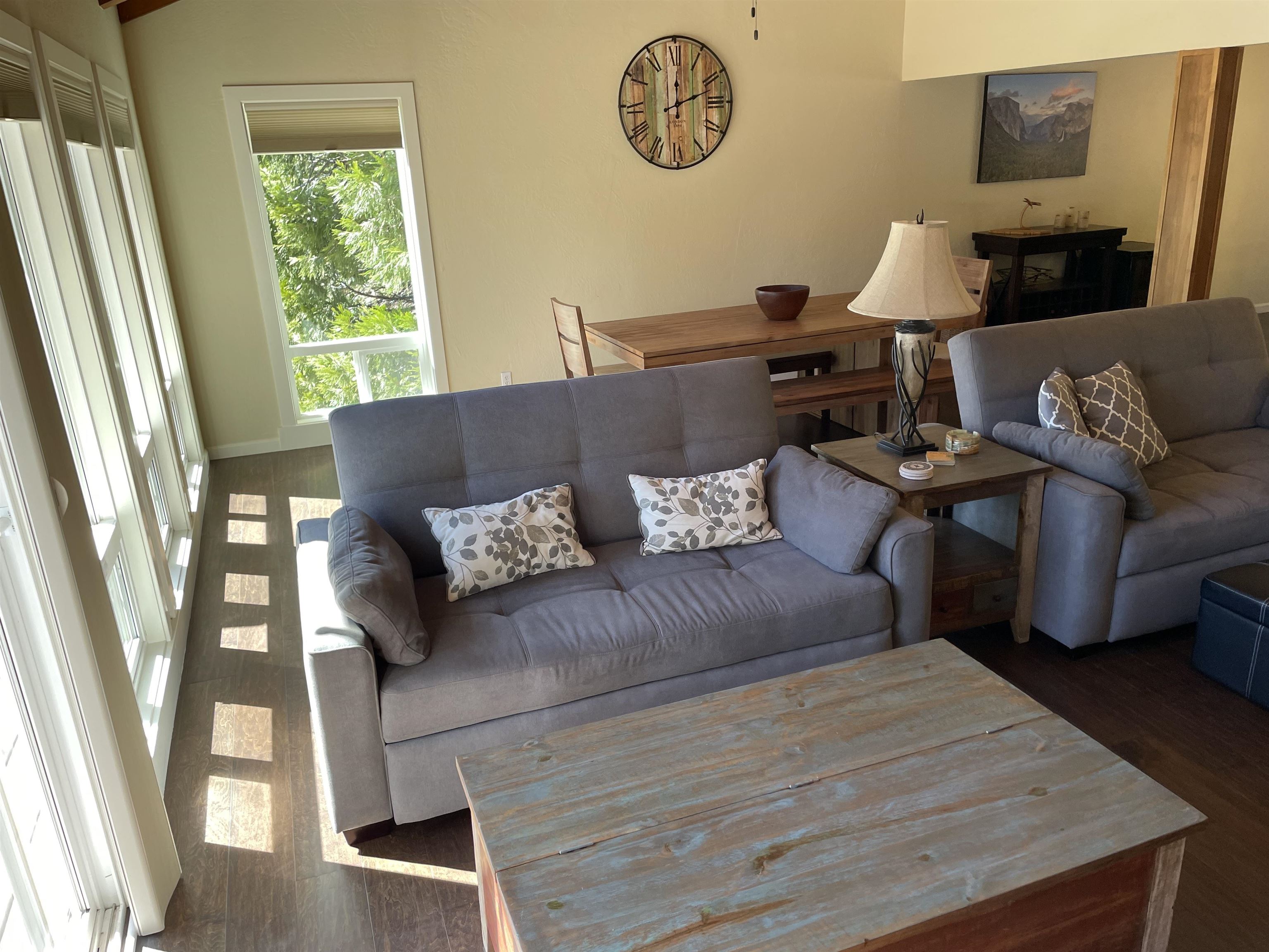 831 Timber Ridge Road Lake Almanor, CA 96137 - Photo 10 of 36 a living room with furniture and a window
