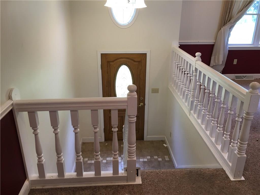 1040 Temple Road Monaca, PA 15061 - Photo 2 of 12 Entry way - Tiled Floor & Wood Banister.