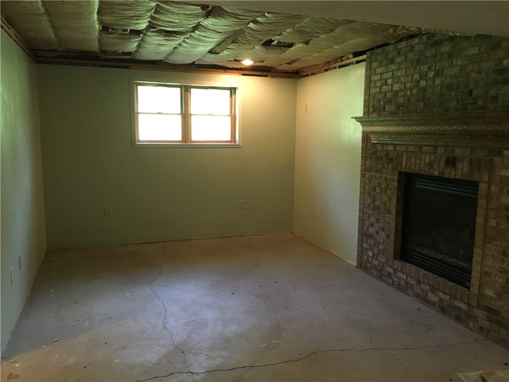 1040 Temple Road Monaca, PA 15061 - Photo 11 of 12 Family Room - 20x12 - Waiting for your finishing touches. Gas Fireplace & Recessed Lighting.