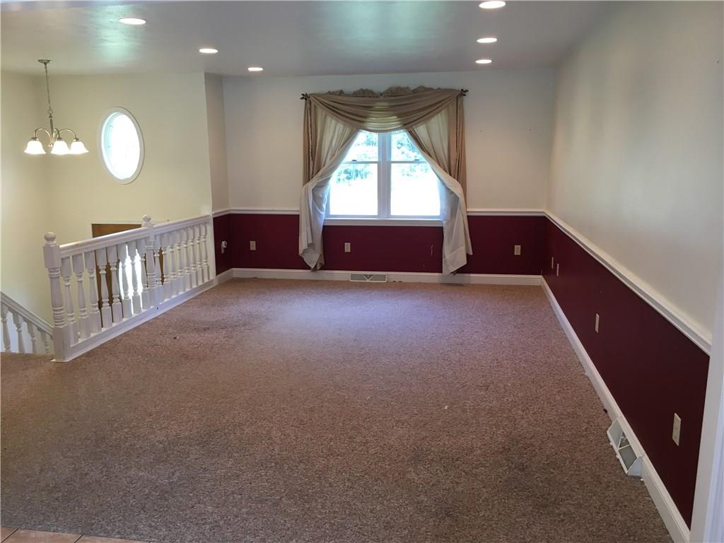 1040 Temple Road Monaca, PA 15061 - Photo 3 of 12 Living Room - 13x10 - Chair Rail and Recessed Lighting.