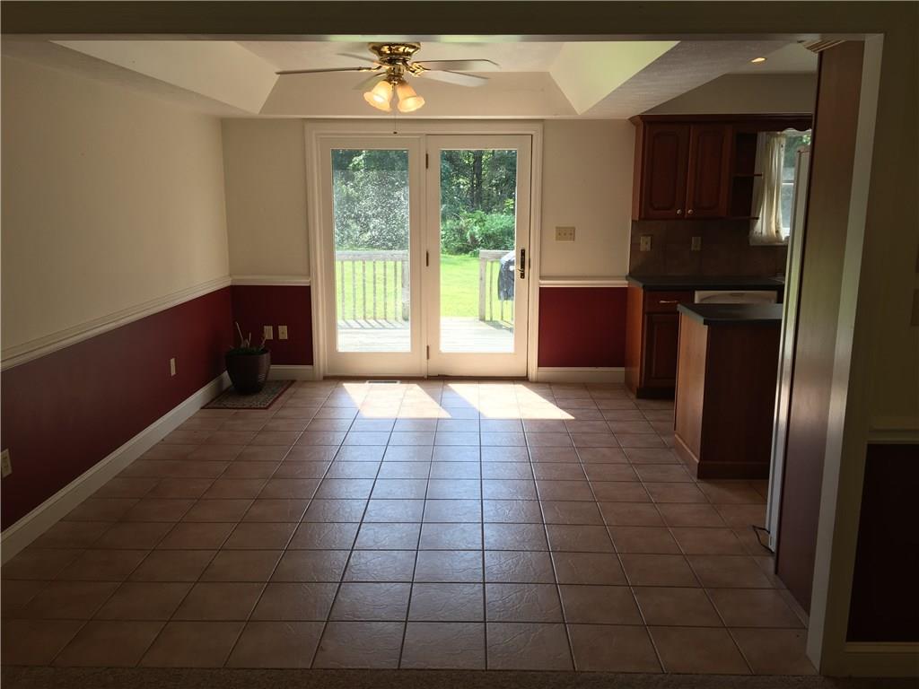 1040 Temple Road Monaca, PA 15061 - Photo 5 of 12 Dining Room - 17x13 - Tray Ceiling, French Doors leading to deck overlooking backyard.