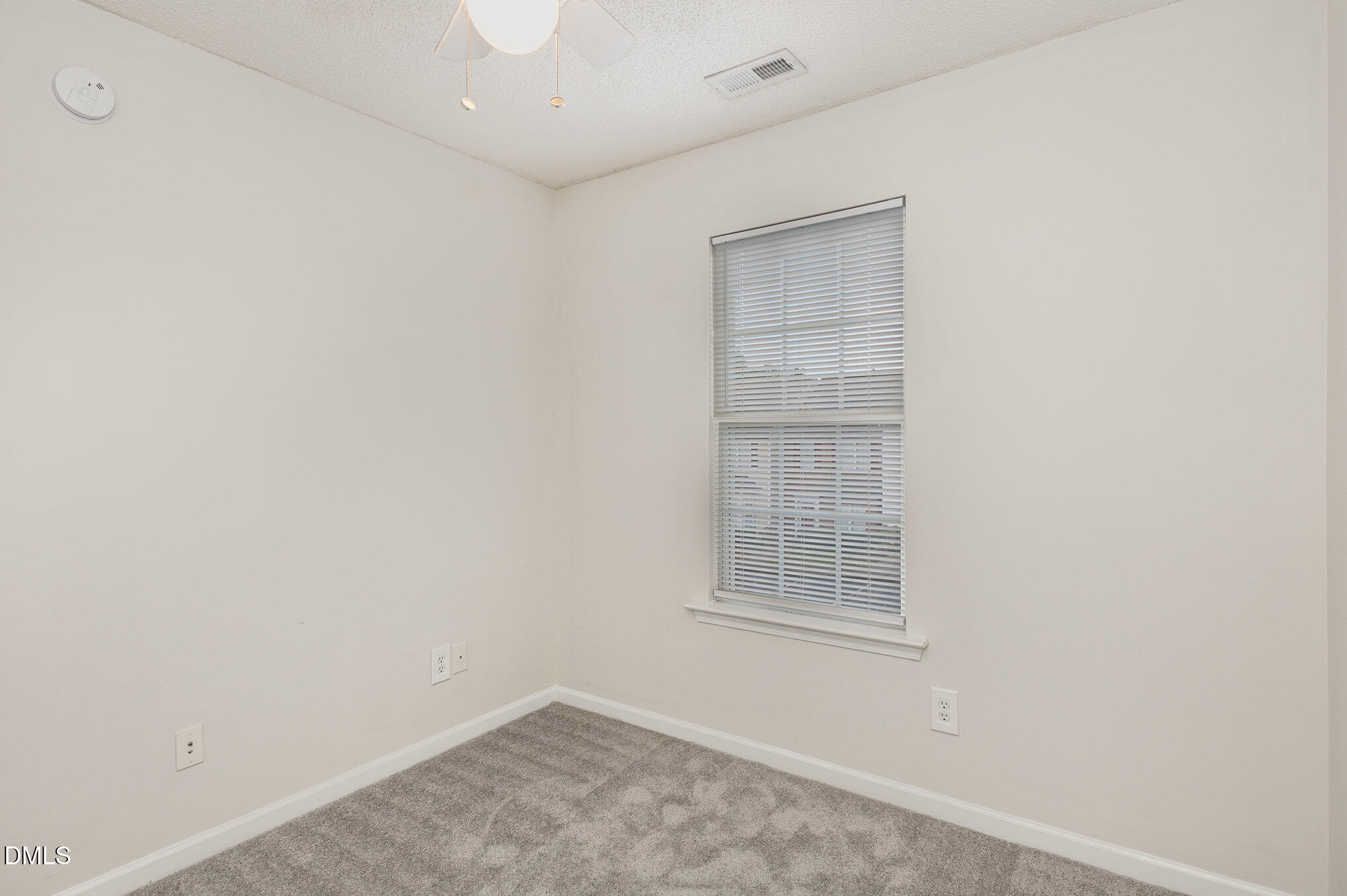 10947 Pendragon Place Raleigh, NC 27614 - Photo 17 of 21 an empty room with windows