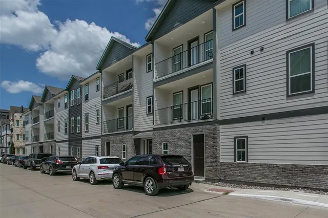 a view of a building with a street