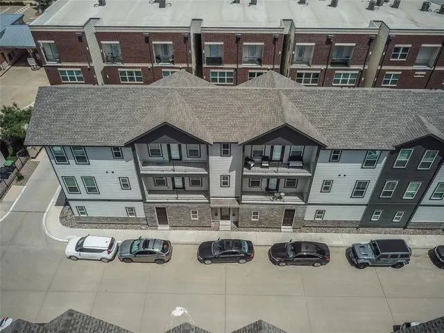 a view of a kitchen area with furniture and rug