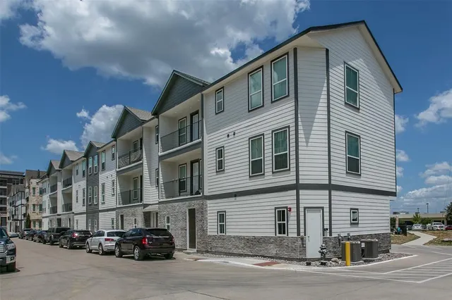 a car parked in front of a building
