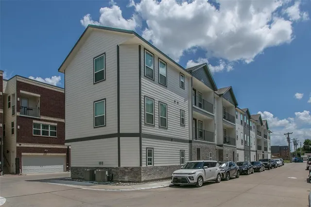 a car parked in front of a building