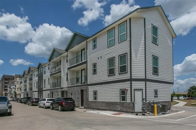 a view of a building with a street