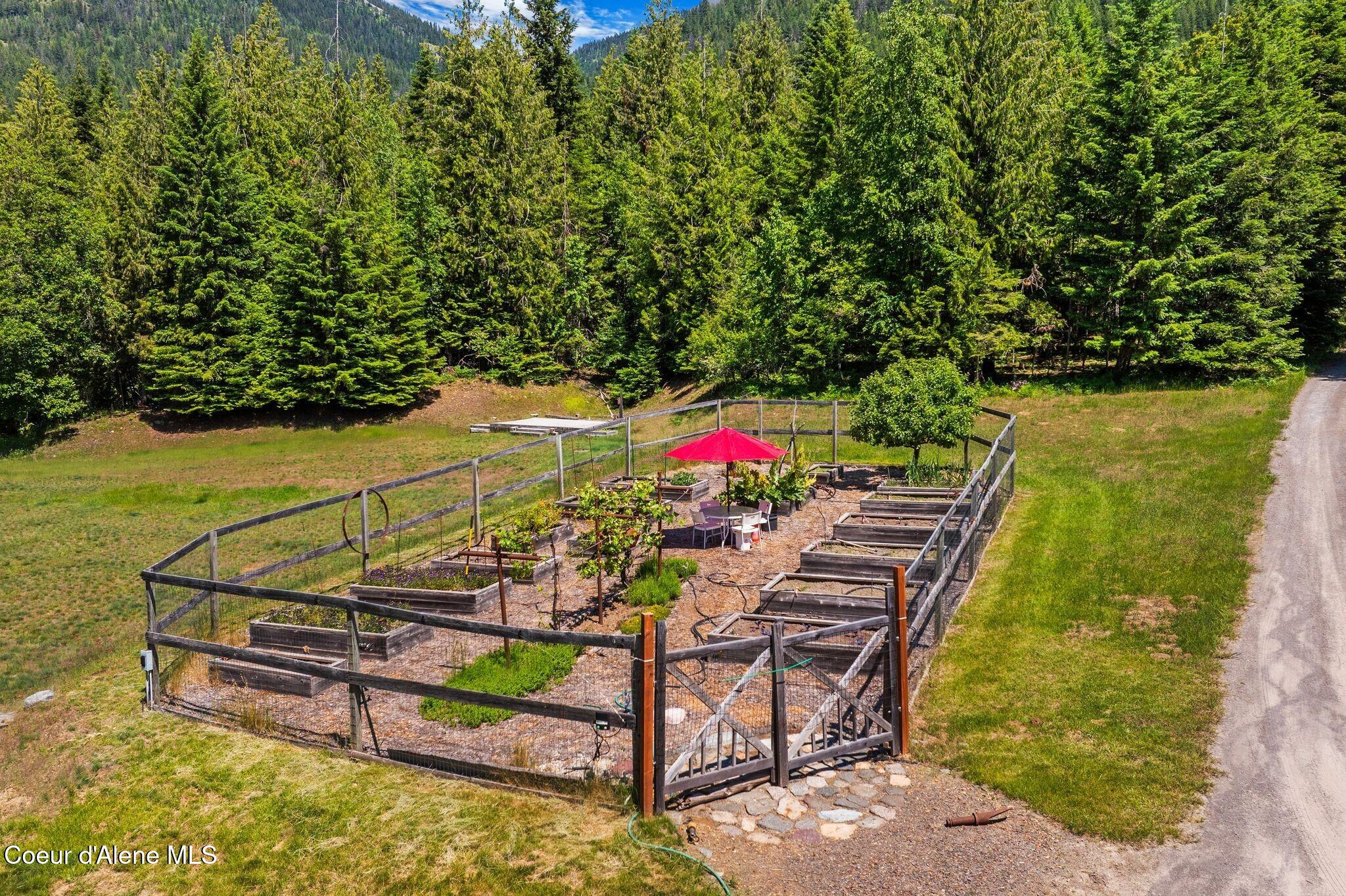 343 West Spring Creek Road Hope, ID 83836 - Photo 45 of 55 Fenced Garden with Raised Beds