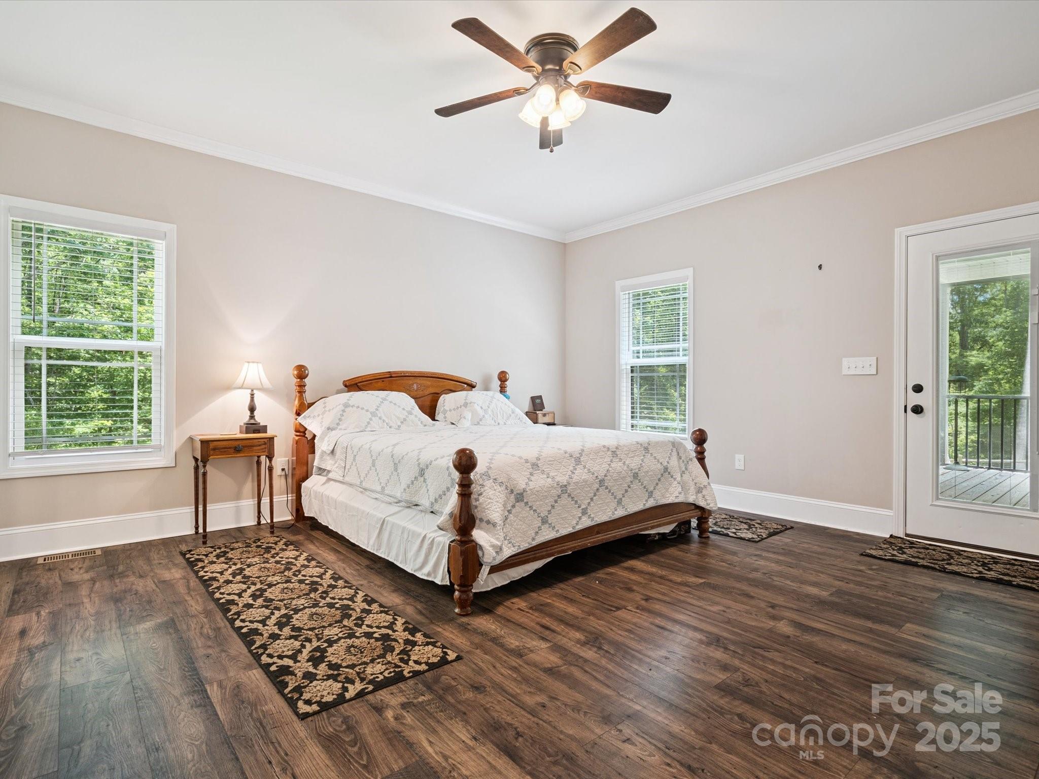 820 King Road Clover, SC 29710 - Photo 14 of 48 a bedroom with a bed chandelier and a window
