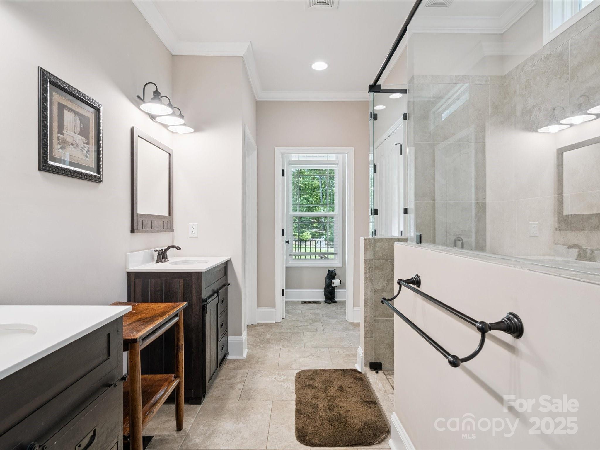 820 King Road Clover, SC 29710 - Photo 16 of 48 a bathroom with a sink a toilet a mirror and shower