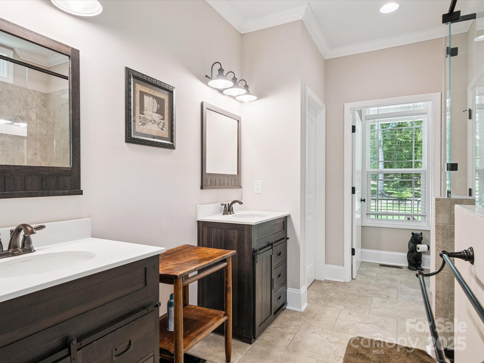 820 King Road Clover, SC 29710 - Photo 18 of 48 a spacious bathroom with a sink double vanity and a mirror