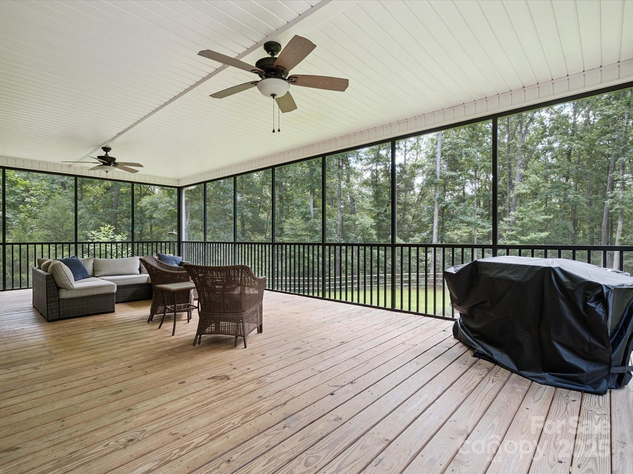 820 King Road Clover, SC 29710 - Photo 32 of 48 a balcony with wooden floor and glass door