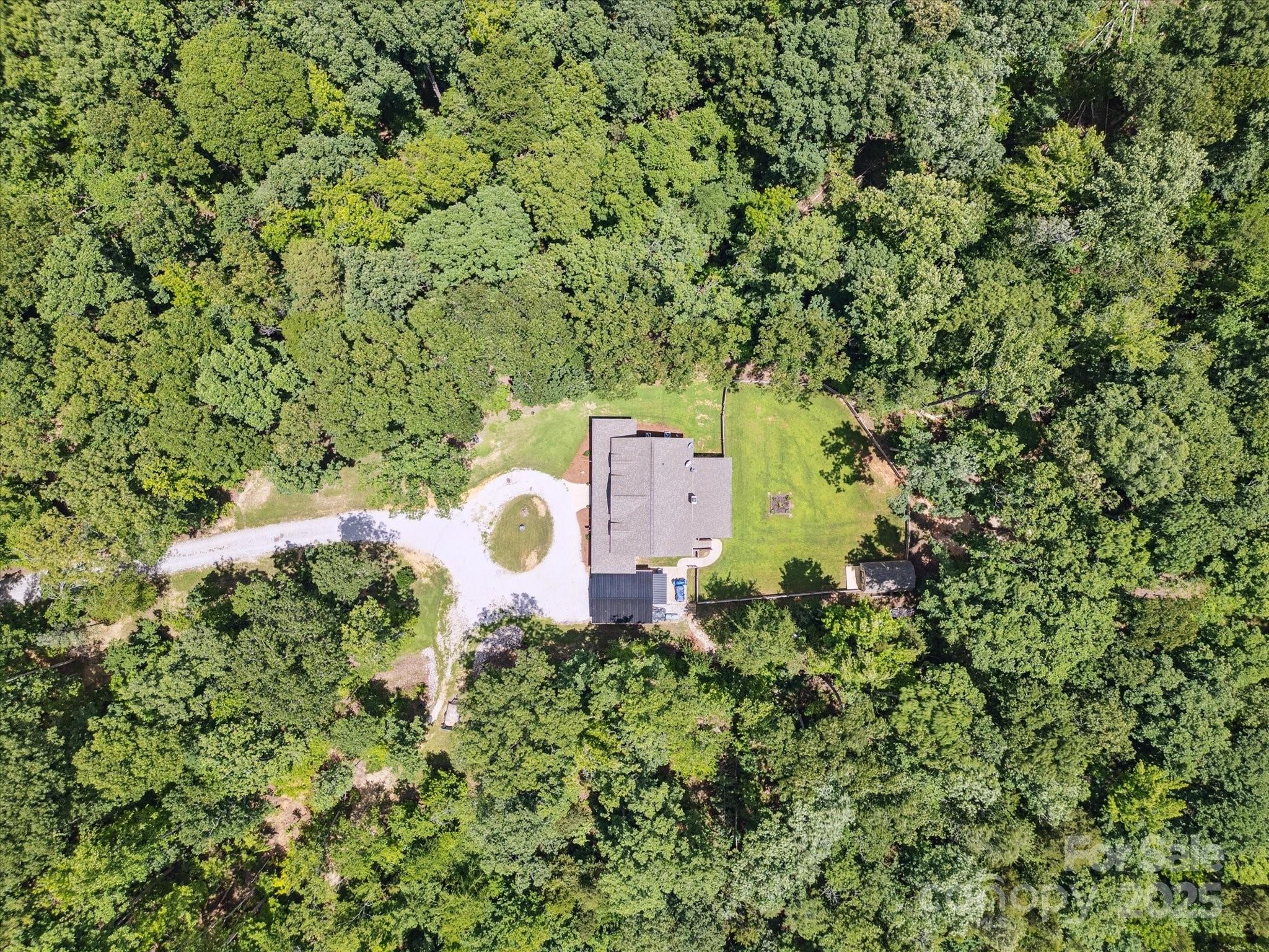 820 King Road Clover, SC 29710 - Photo 43 of 48 an aerial view of a house with a yard and trees