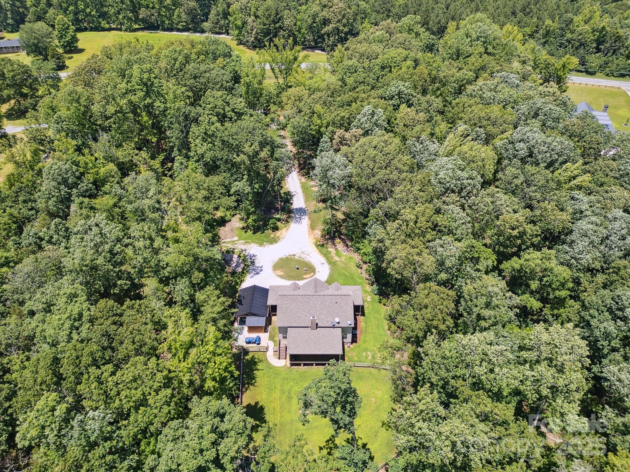 820 King Road Clover, SC 29710 - Photo 45 of 48 an aerial view of a house with a yard swimming pool and outdoor seating