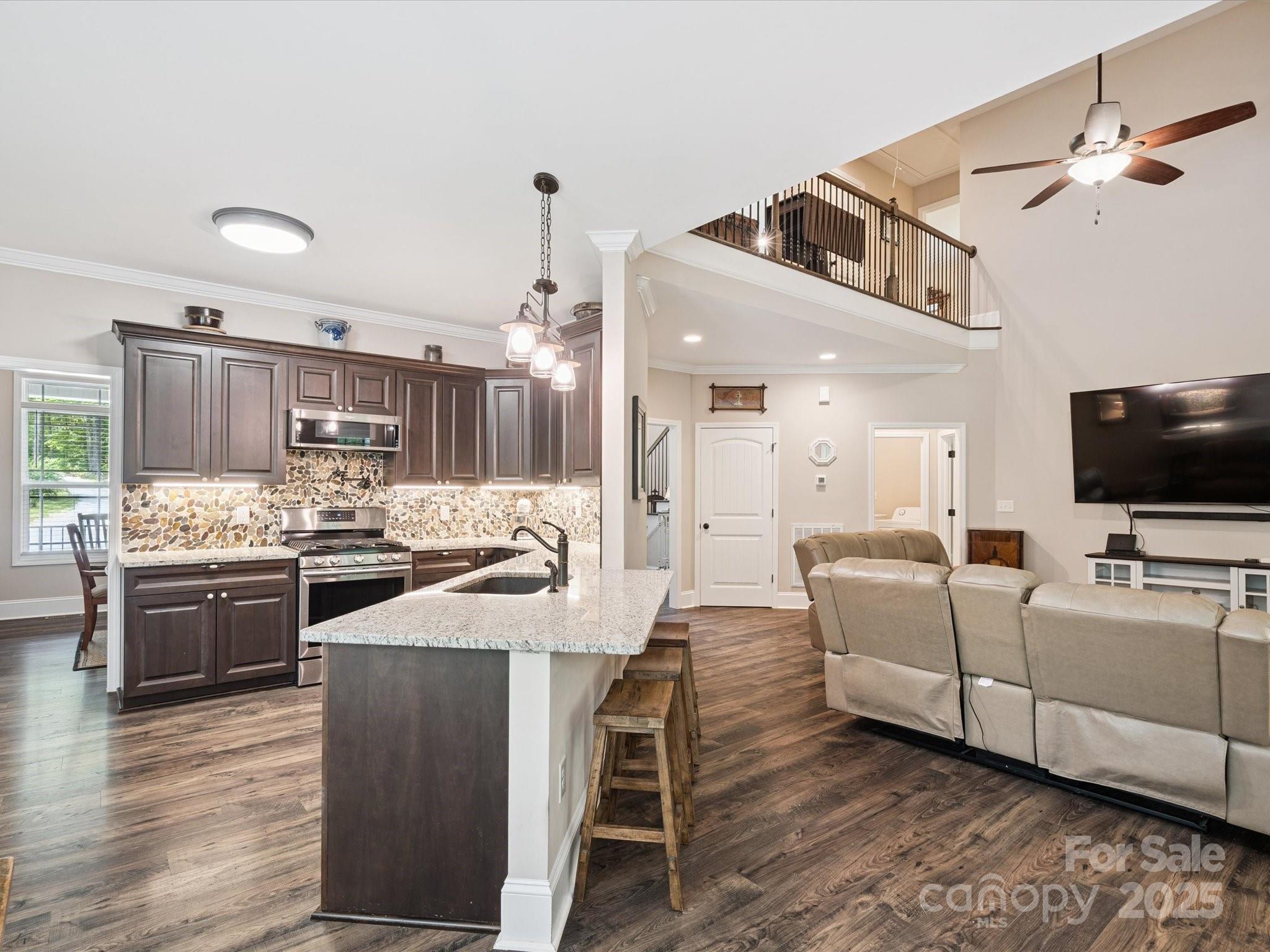 820 King Road Clover, SC 29710 - Photo 7 of 48 a kitchen with stainless steel appliances kitchen island granite countertop a sink and a stove