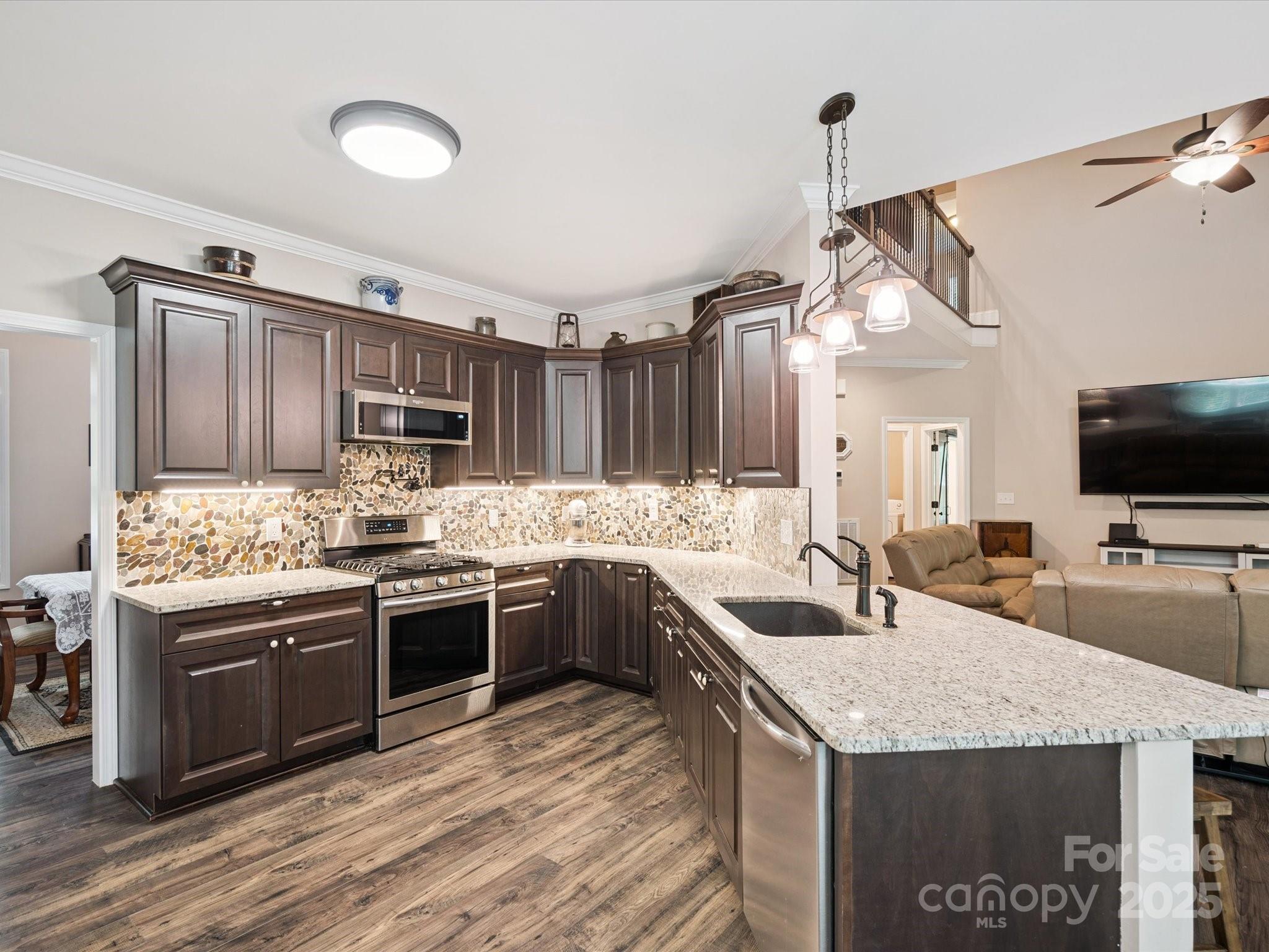 820 King Road Clover, SC 29710 - Photo 9 of 48 a kitchen with stainless steel appliances granite countertop a sink stove and refrigerator