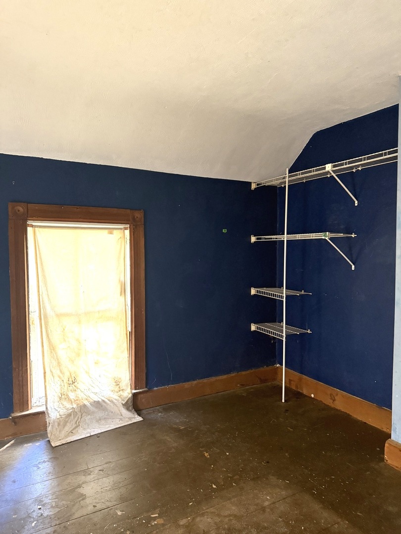 574 Herman Street Crete, IL 60417 - Photo 11 of 18 a view of an empty room with a window