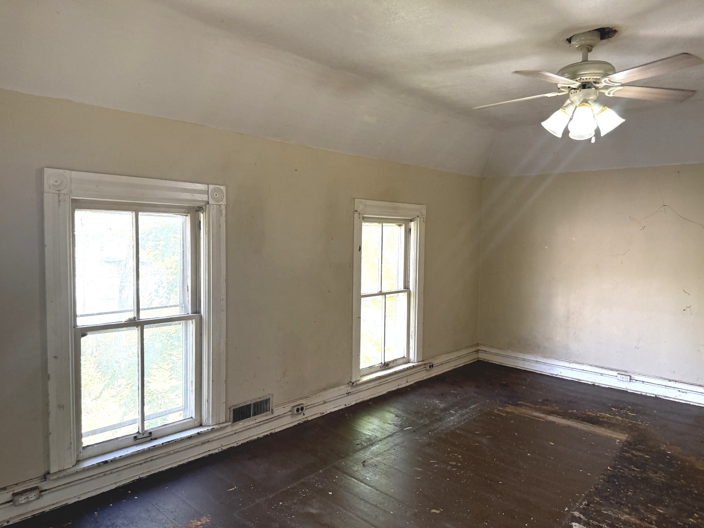 574 Herman Street Crete, IL 60417 - Photo 12 of 18 wooden floor in an empty room with a window