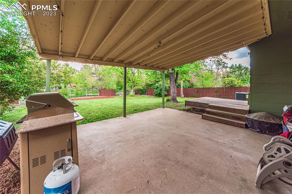 1917 Wooten Road Colorado Springs, CO 80915 - Photo 29 of 35 a garden view with a seating space