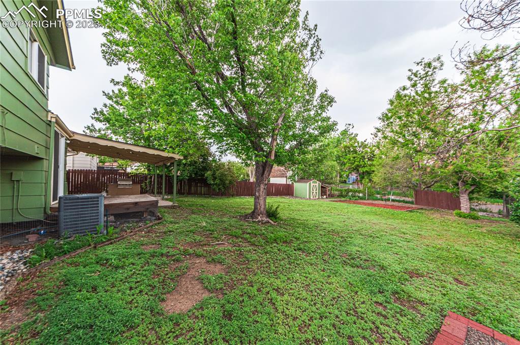 1917 Wooten Road Colorado Springs, CO 80915 - Photo 31 of 35 a garden view with a seating space