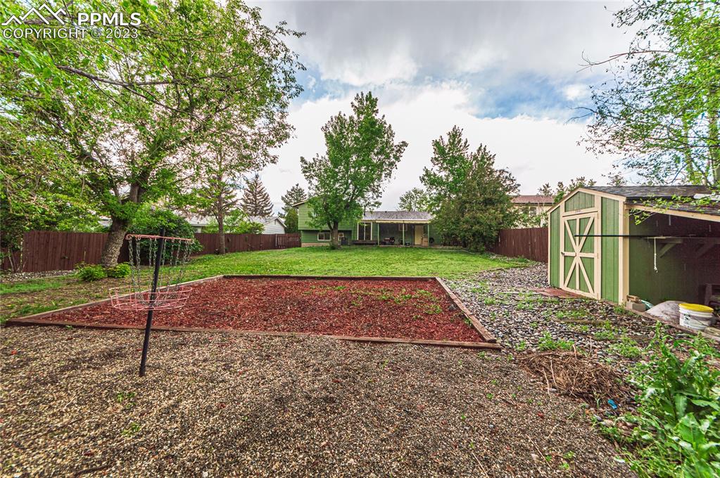 1917 Wooten Road Colorado Springs, CO 80915 - Photo 34 of 35 a view of outdoor space with green space