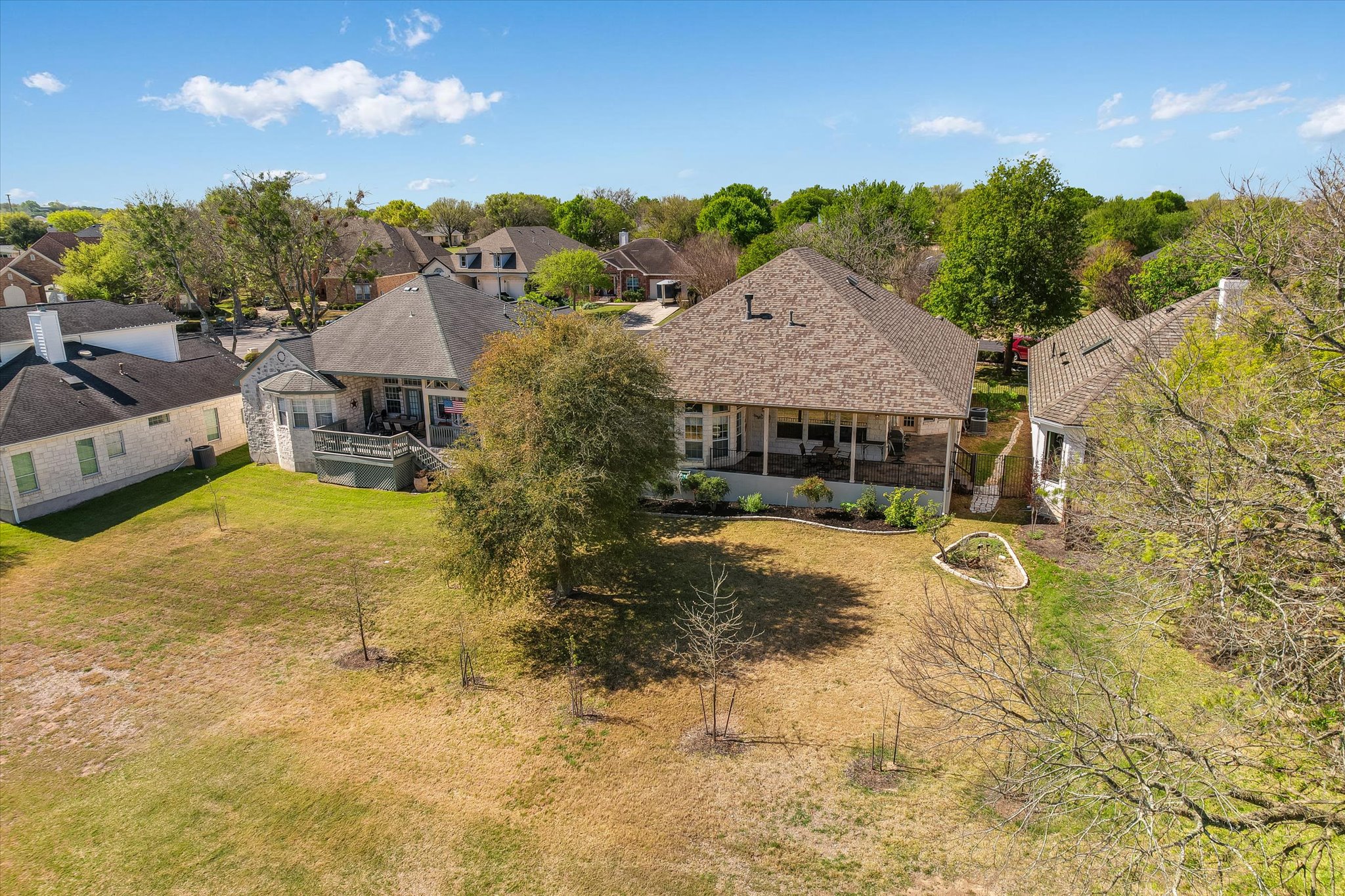 4912 Interlachen Lane Austin, TX 78747 - Photo 31 of 39 a view of a house with swimming pool and sitting area