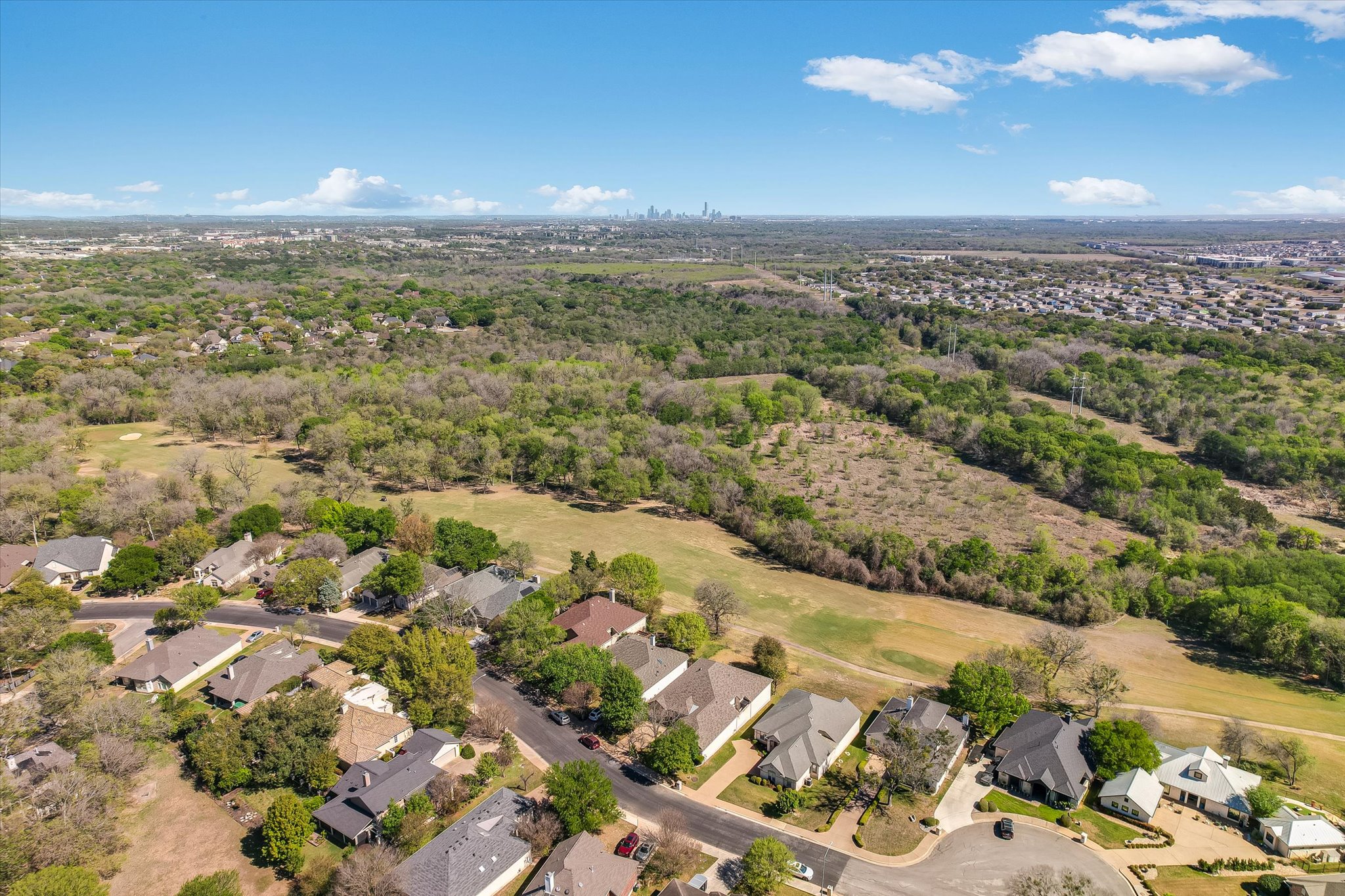 4912 Interlachen Lane Austin, TX 78747 - Photo 32 of 39 an aerial view of a city