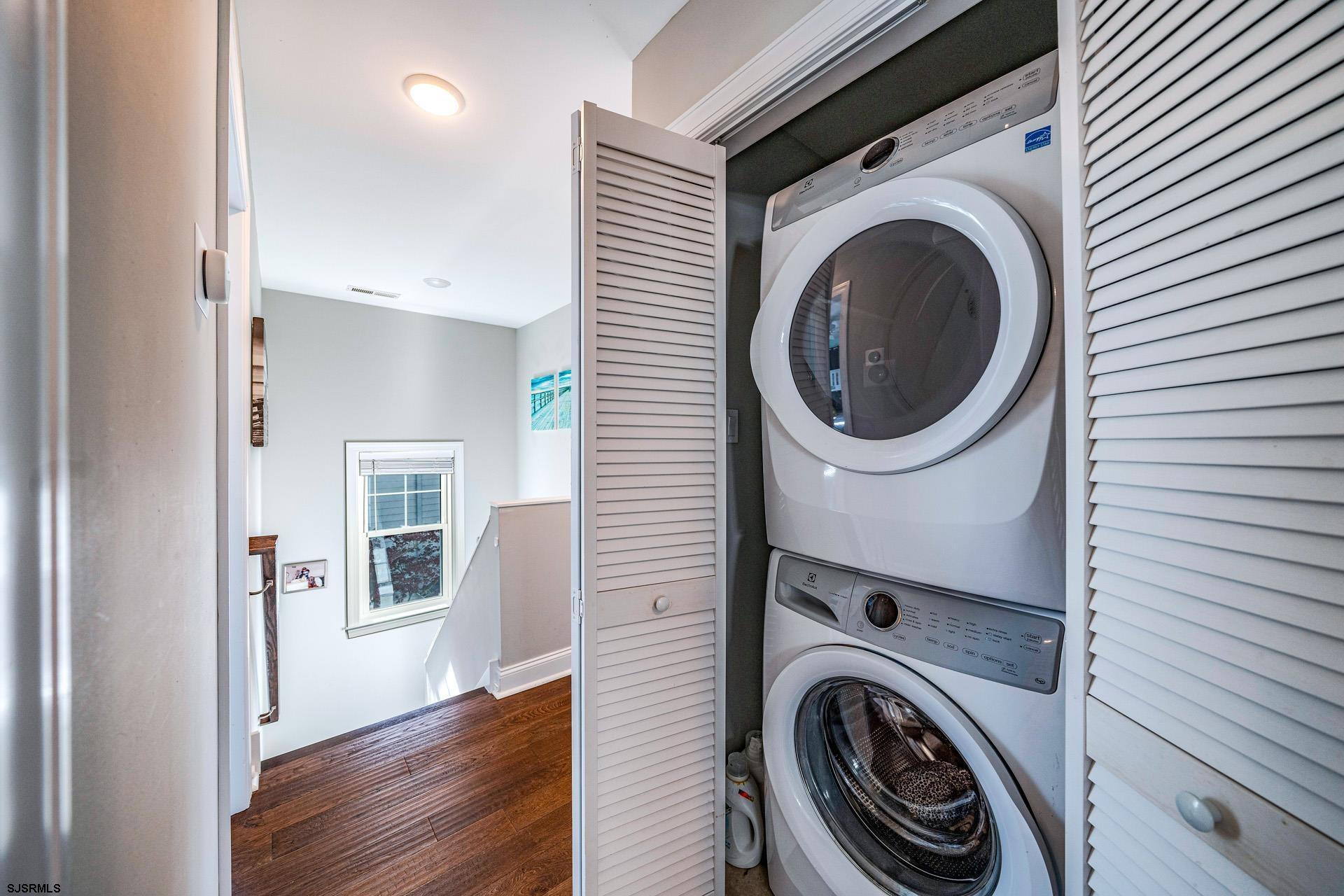 225 West Inlet Road Ocean City, NJ 08226 - Photo 15 of 56 a view of a hallway with washer and dryer