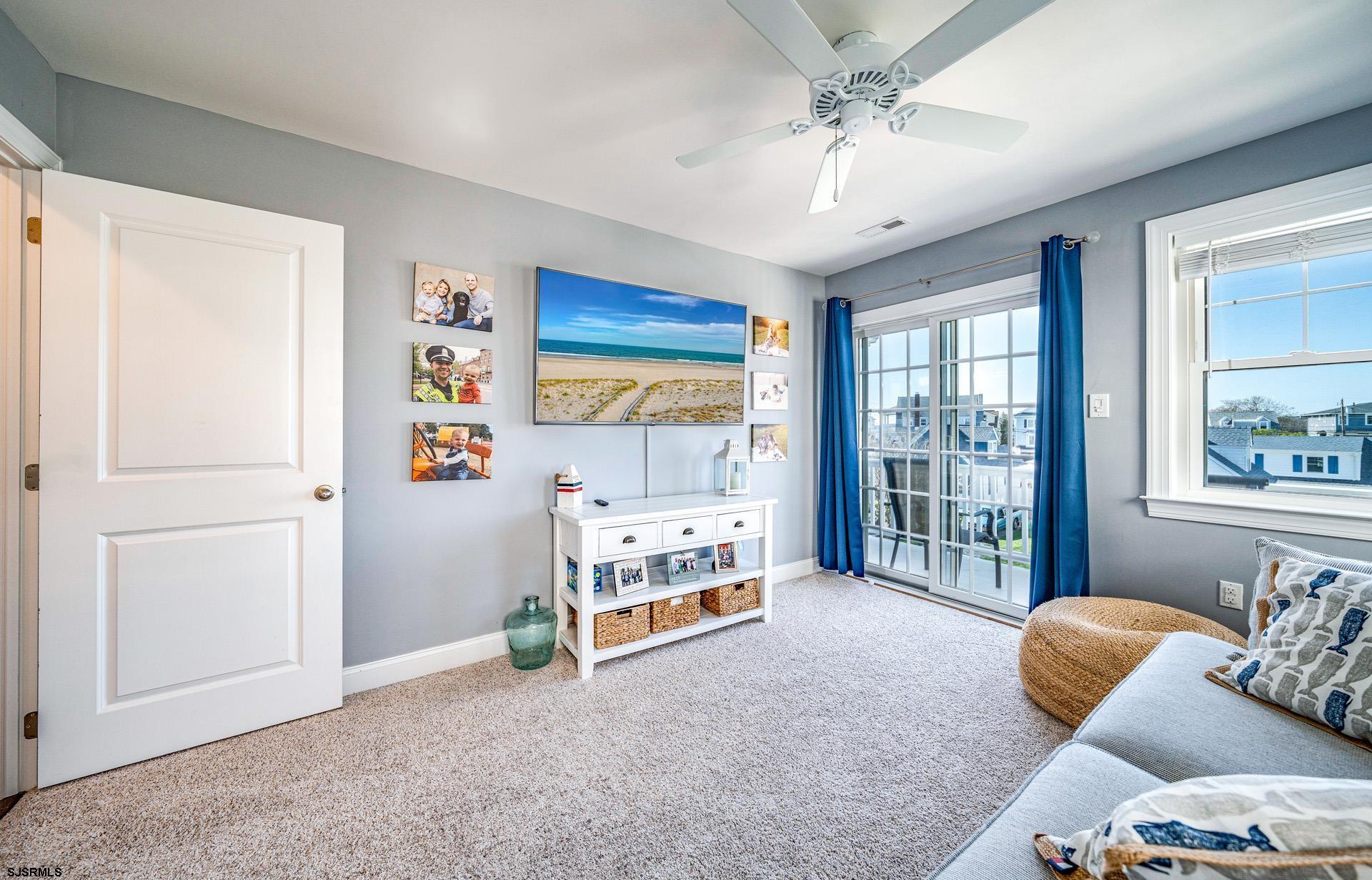 225 West Inlet Road Ocean City, NJ 08226 - Photo 26 of 56 a room with furniture and a window