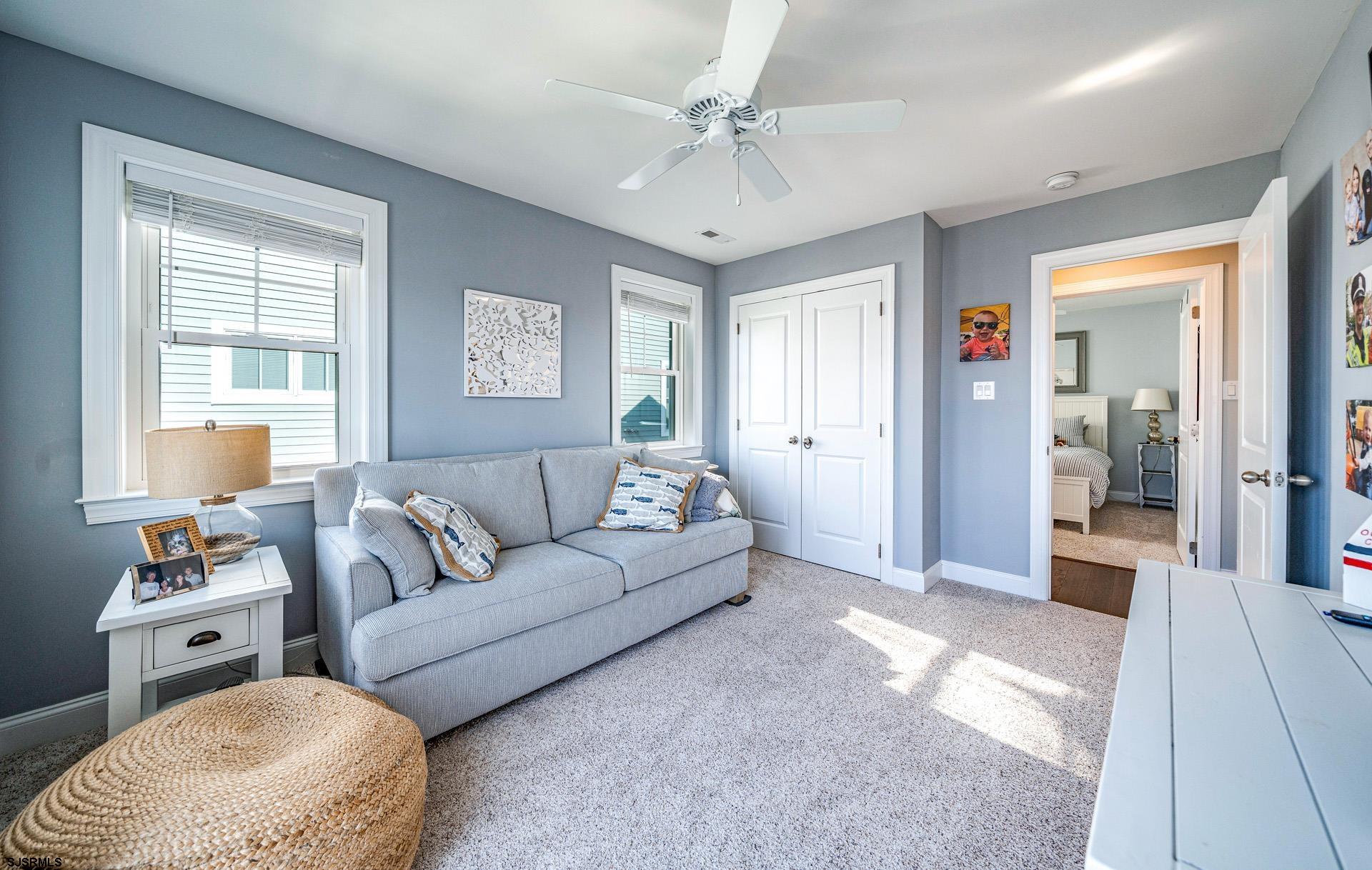 225 West Inlet Road Ocean City, NJ 08226 - Photo 27 of 56 a living room with furniture and a window