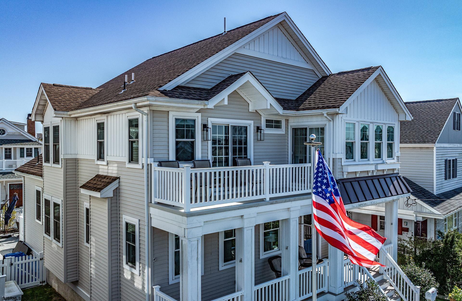 225 West Inlet Road Ocean City, NJ 08226 - Photo 38 of 56 a front view of a house with balcony