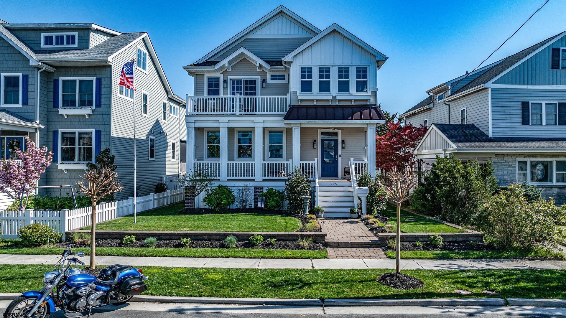 225 West Inlet Road Ocean City, NJ 08226 - Photo 39 of 56 a front view of a house with a yard