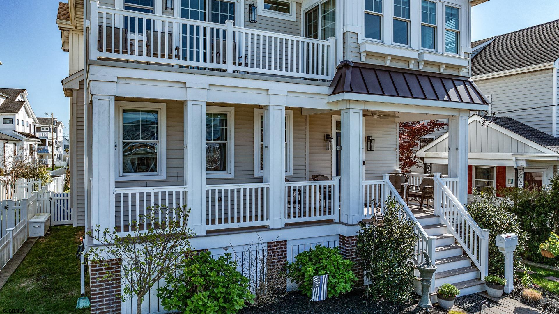 225 West Inlet Road Ocean City, NJ 08226 - Photo 53 of 56 front view of a house with a porch