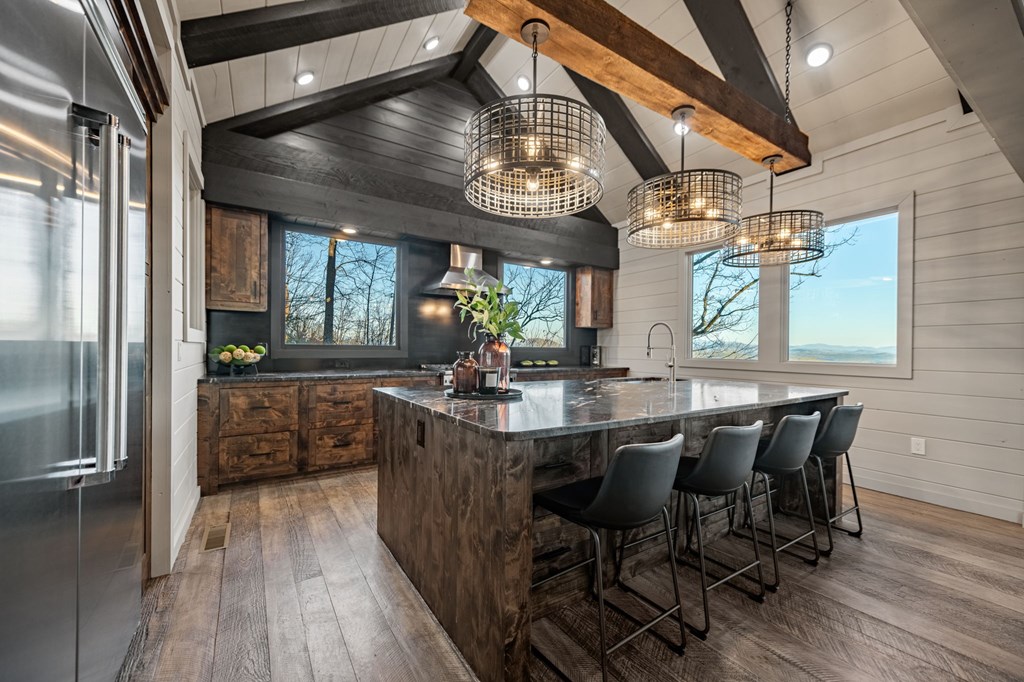 799 Bruce Mountain Road Morganton, GA 30560 - Photo 14 of 48 a view of a dining room with furniture window and wooden floor