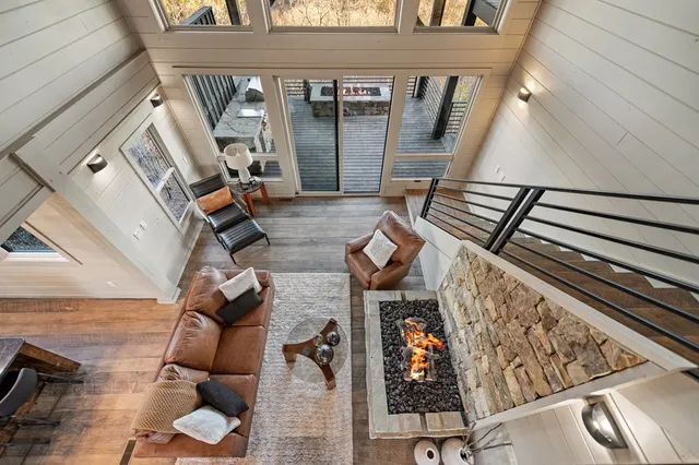a view of living room with furniture and floor to ceiling window