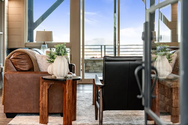 a front view of a residential houses with glass windows