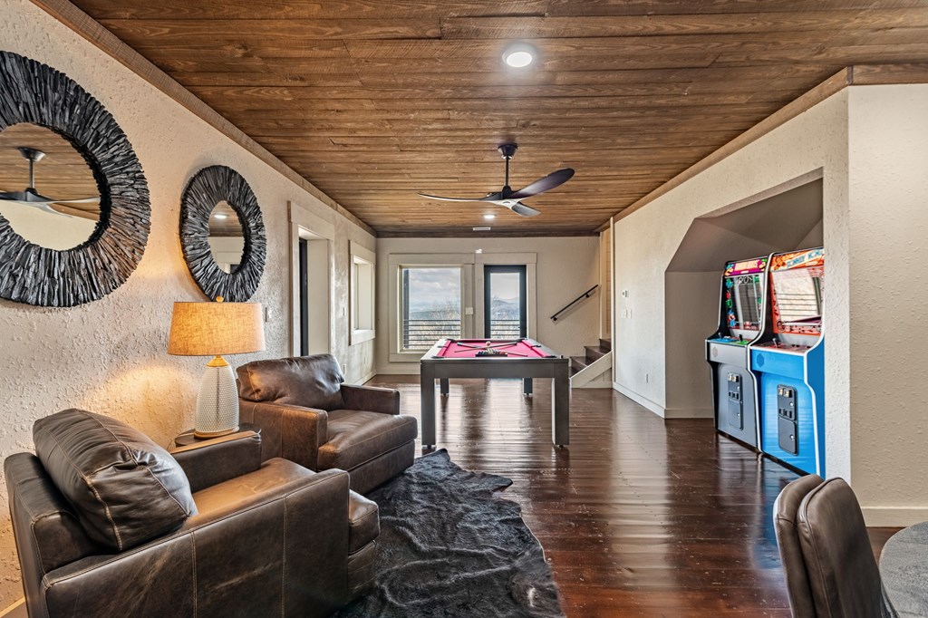 799 Bruce Mountain Road Morganton, GA 30560 - Photo 39 of 48 a living room with furniture and a wooden floor