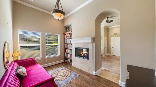 a bathroom with a granite countertop tub shower and sink
