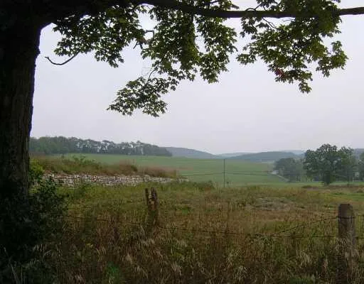 a view of a lake with a mountain in the background