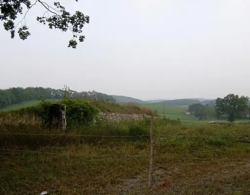 a view of a lake with mountains in the background