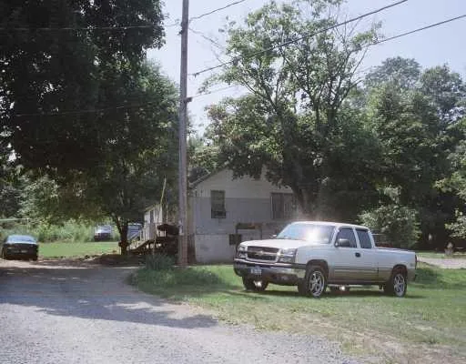a car parked in front of a house