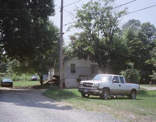 36 Taylor Road Warwick, NY 10990 - Photo 6 of 8 a car parked in front of a house